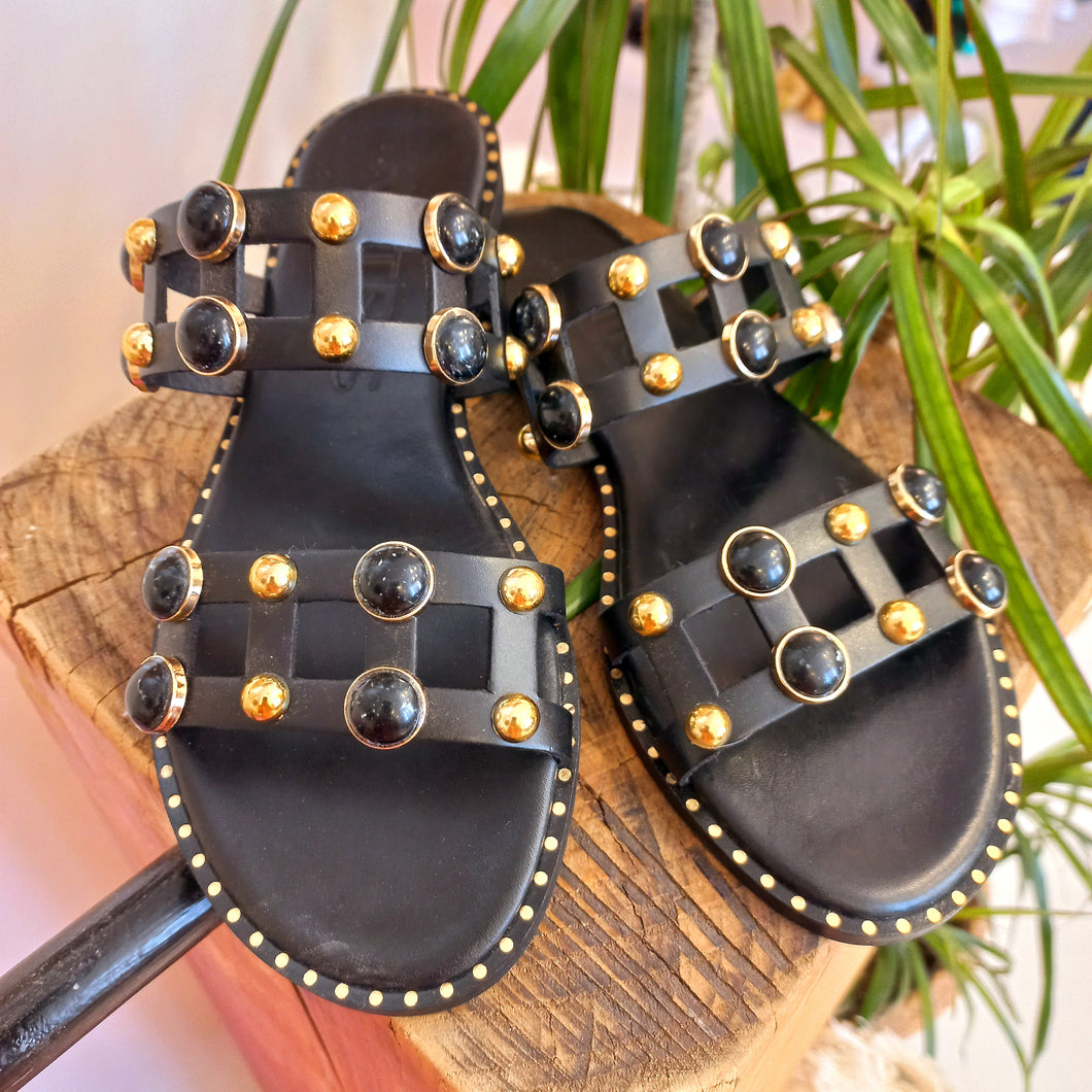 FLAT SANDAL WITH GOLD-FINISH AND CERAMIC STUDS